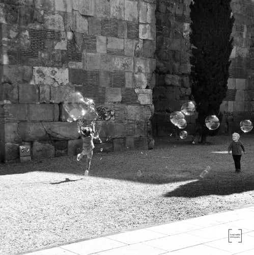Children playing with bubbles